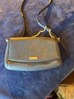 kate spade black leather crossbody with gold chain trim